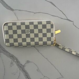 Checkered wallet with wrist strap